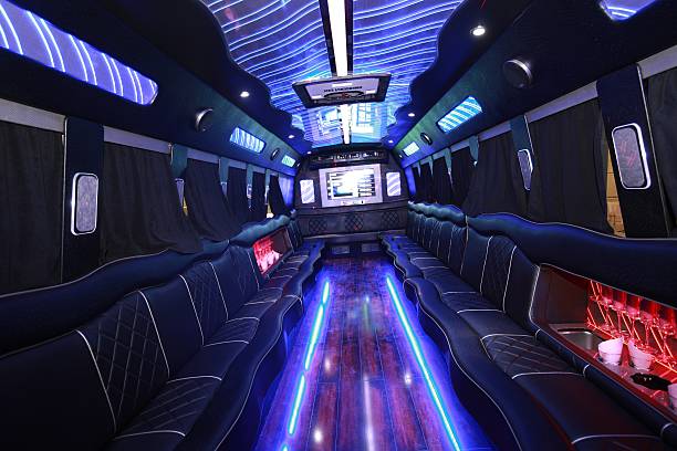 A big party bus filled with comfortable seats, and shiny bright floor for dancing and having fun.